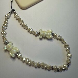 Cell phone wristlet from The Charm Hut works on any phone case